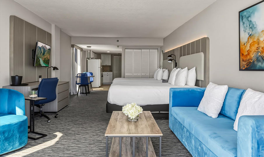 enlarged view of guest room sitting area and balcony