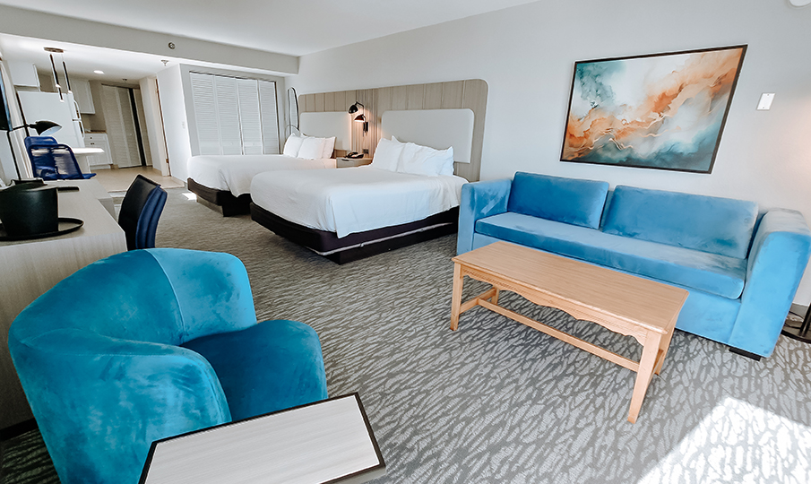 enlarged view of guest room sitting area and balcony